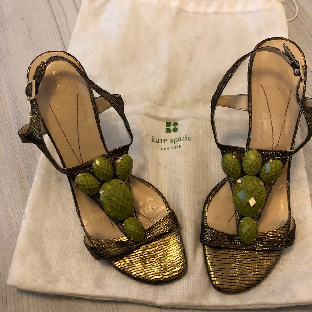 Kate Spade gold sandals with green stones.